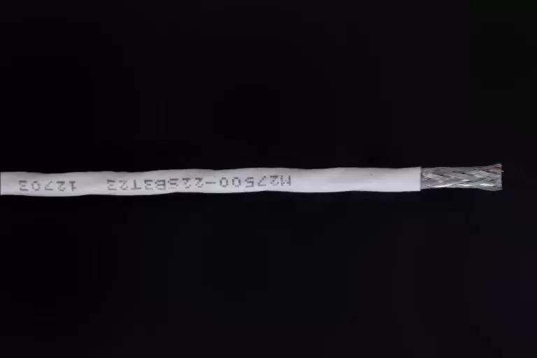 M27500-22SB3T23 12703 white colored wrapper for black wire.